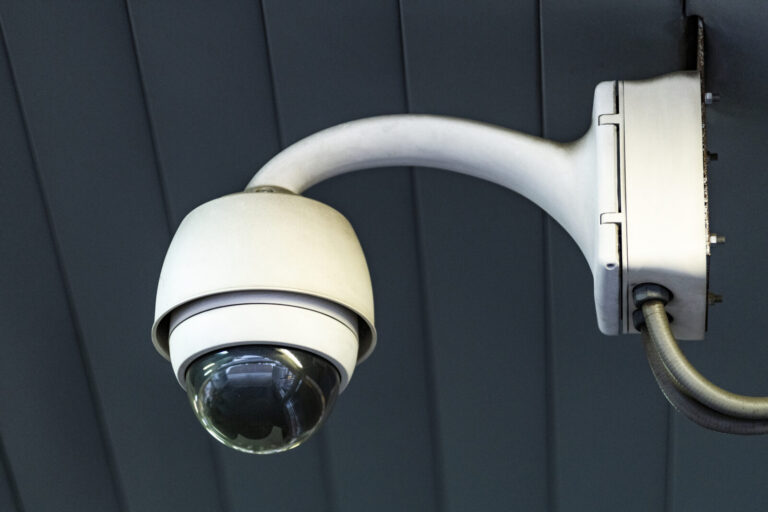 CCTV security camera mounted on a ceiling