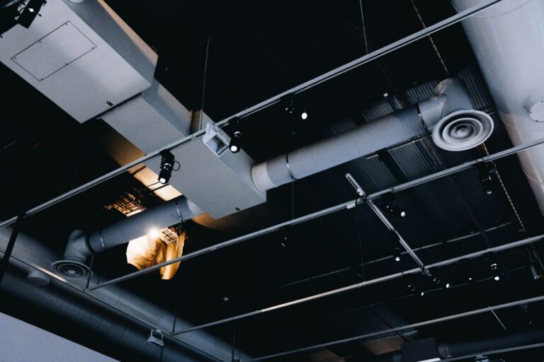Overhead pipework network running across a building ceiling